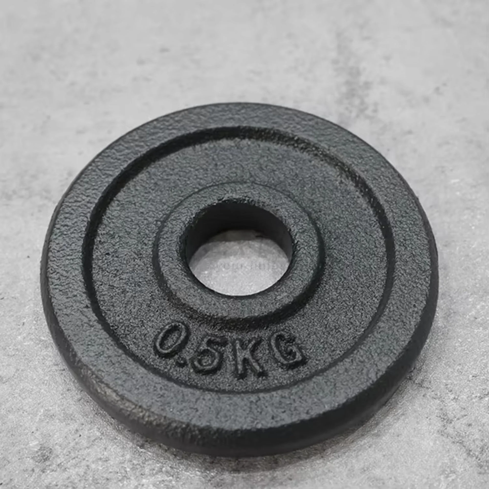 Disco de Pesas de 0,5 kg en Hierro Fundido – Resistencia y Calidad para tu Entrenamiento - Image 2